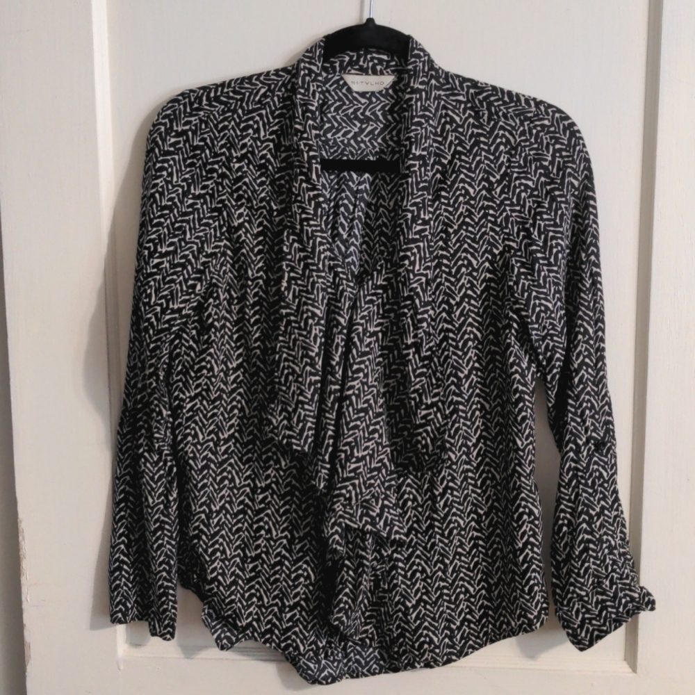 Anthropologie black and cream button up ruffle front blouse